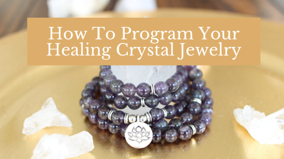 Here's how to program your healing crystal jewelry for all sorts of desires such as wealth, love, career, protection, stress and more.