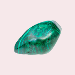 Polished malachite stone with banded green markings